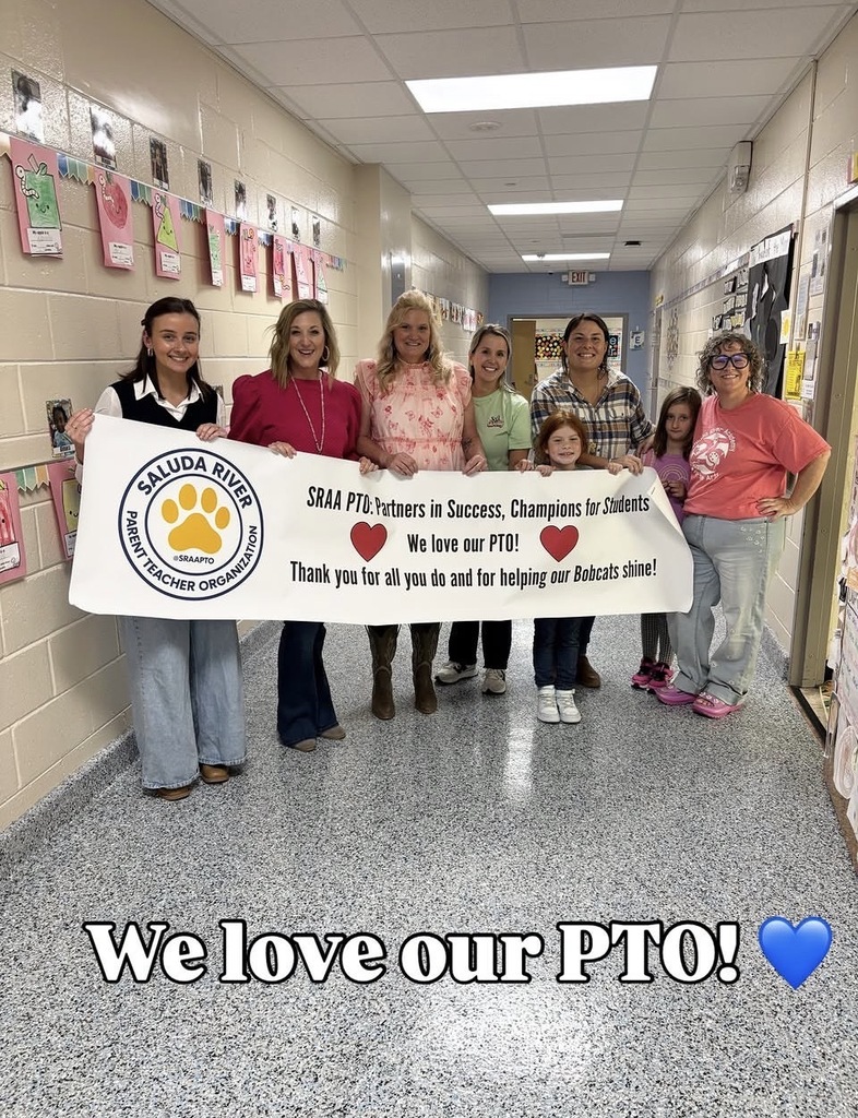 Students and staff holding a banner thanking our PTO!
