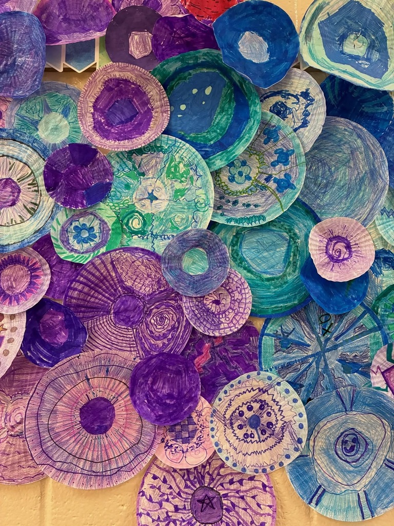 Display of paperplates painted into a display