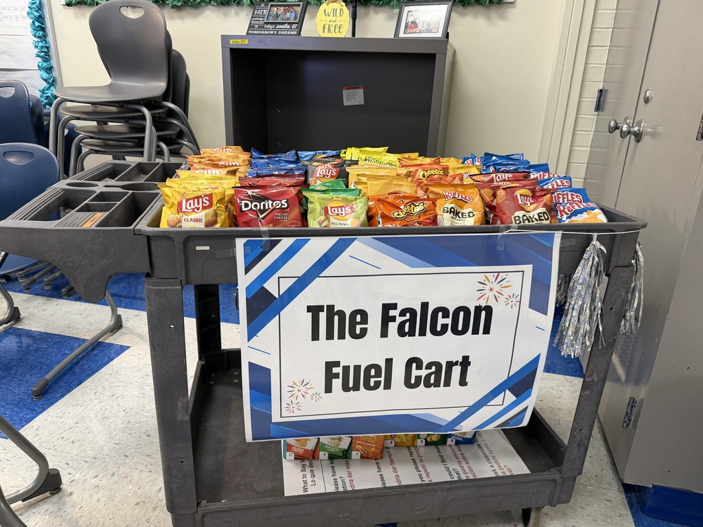 The picture shows the Falcon Fuel Cart with bags of chips on the top of the cart that are given to faculty and staff.