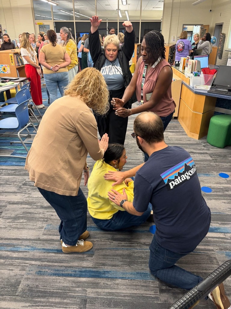 Teachers participating in a team collaboration.