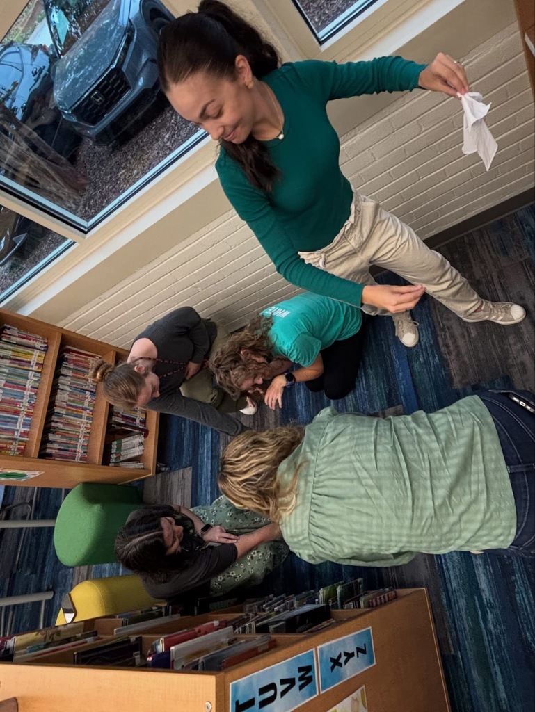 Teachers participating in a team collaboration.