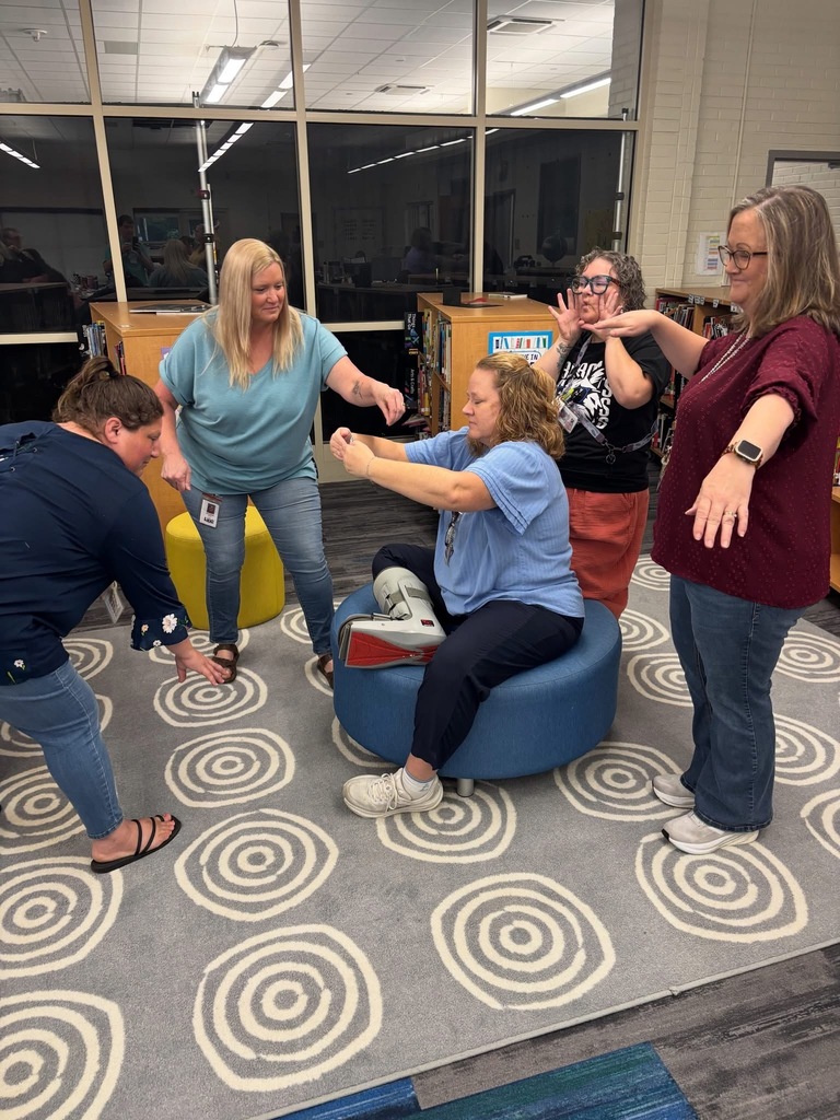 Teachers participating in a team collaboration.