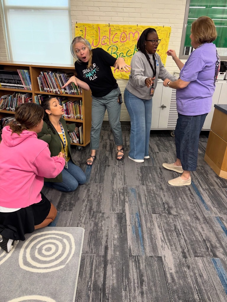 Teachers participating in a team collaboration.