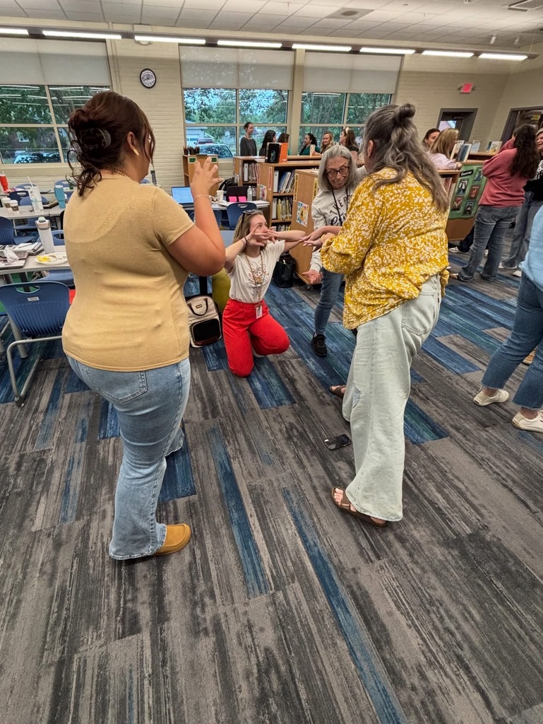 Teachers participating in a team collaboration.