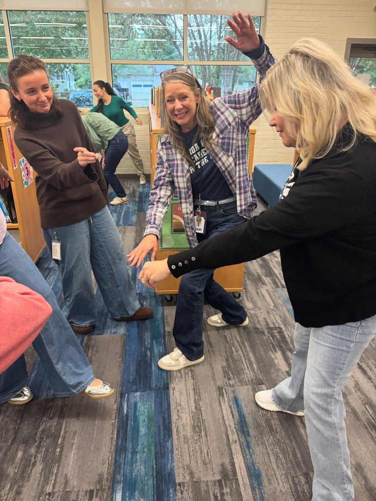 Teachers participating in a team collaboration.