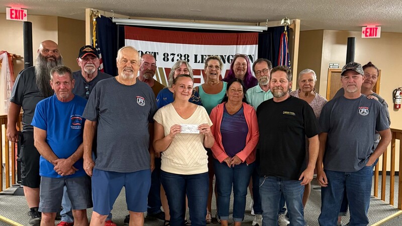 Chance Lexington donates a $750 check