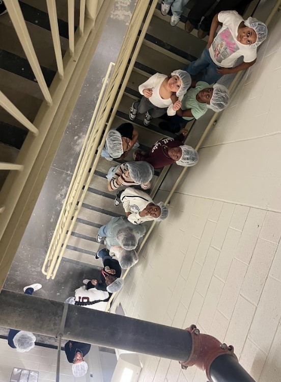 students viewing medicine being produced