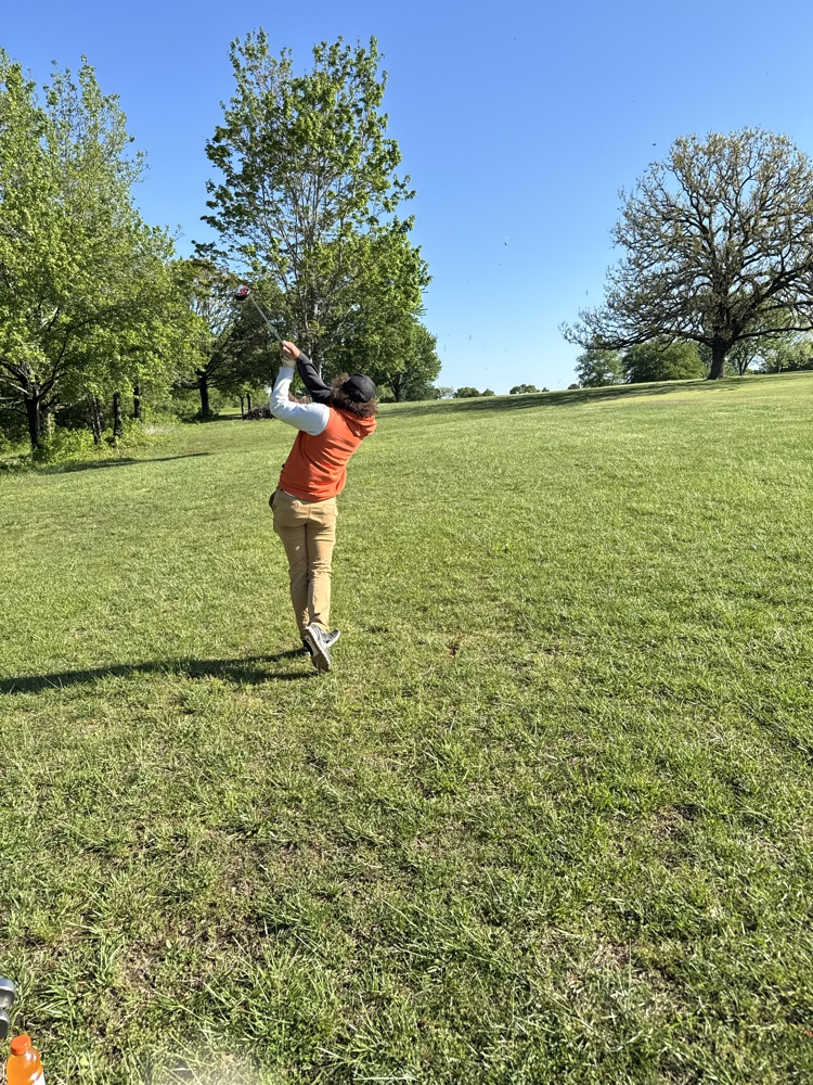 Benton trying to get it back into the fairway  