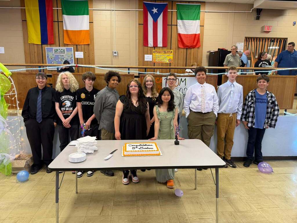 group of students standing for a large group photo and smiling
