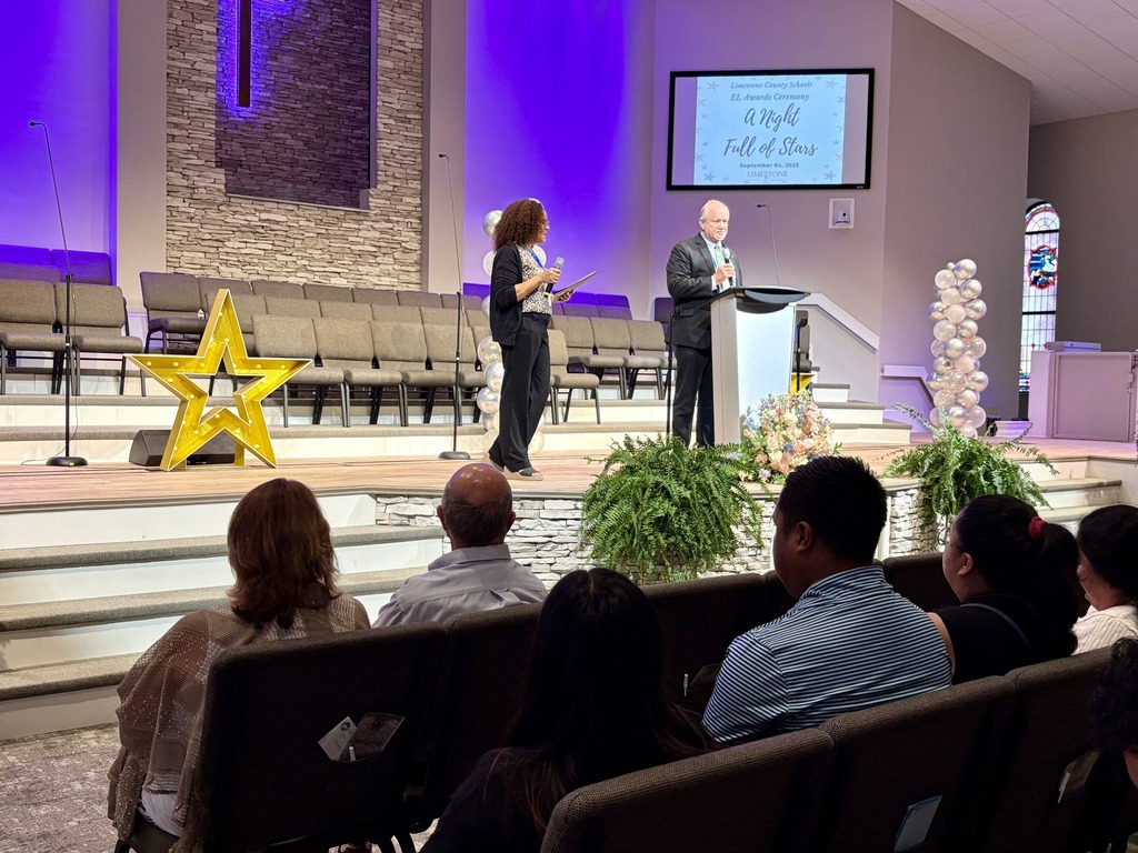 Superintendent Dr. Randy Shearouse speaks with those in attendance at a Nigh of Stars.