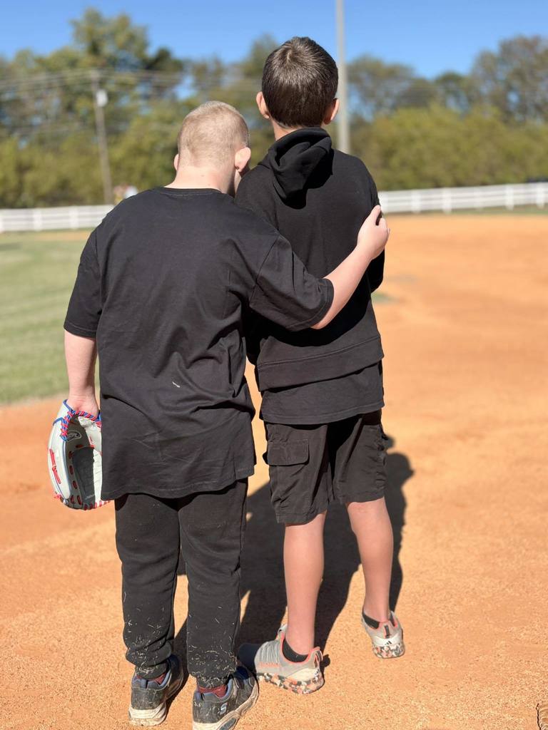 Ardmore High School students participate in an adaptive baseball game. 