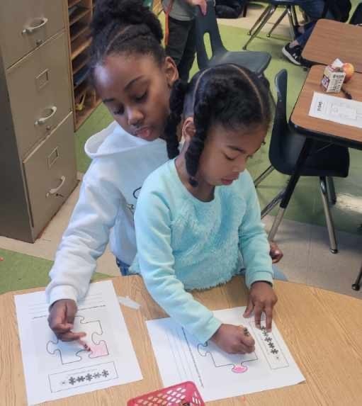 sisters coloring together