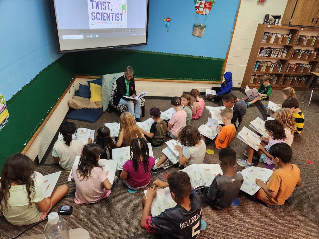 Bishop Students read along with Dr. Collins from EMU STEM Institute