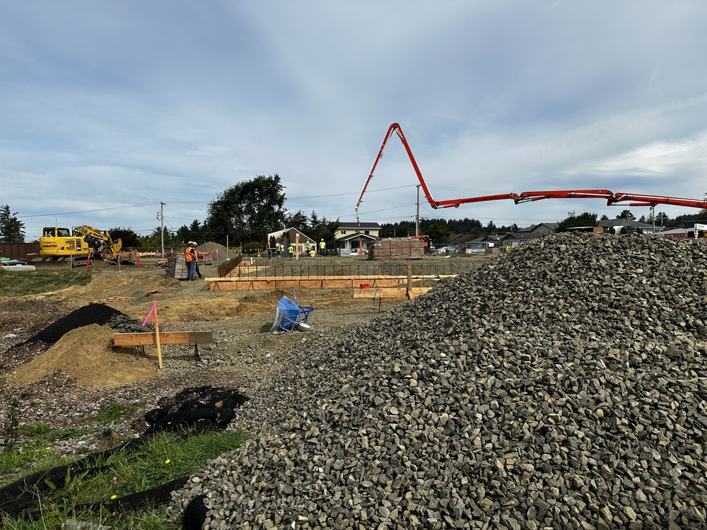 Long crane at a construction site
