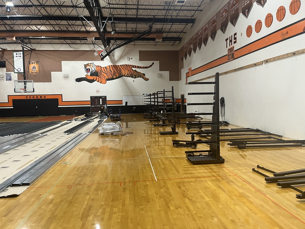 Gym with deconstructed bleachers