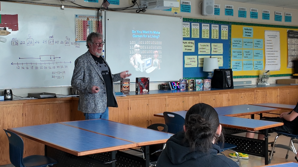 Man talking in front of students