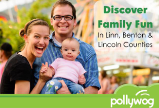 Image of a young woman and man holding a baby and smiling