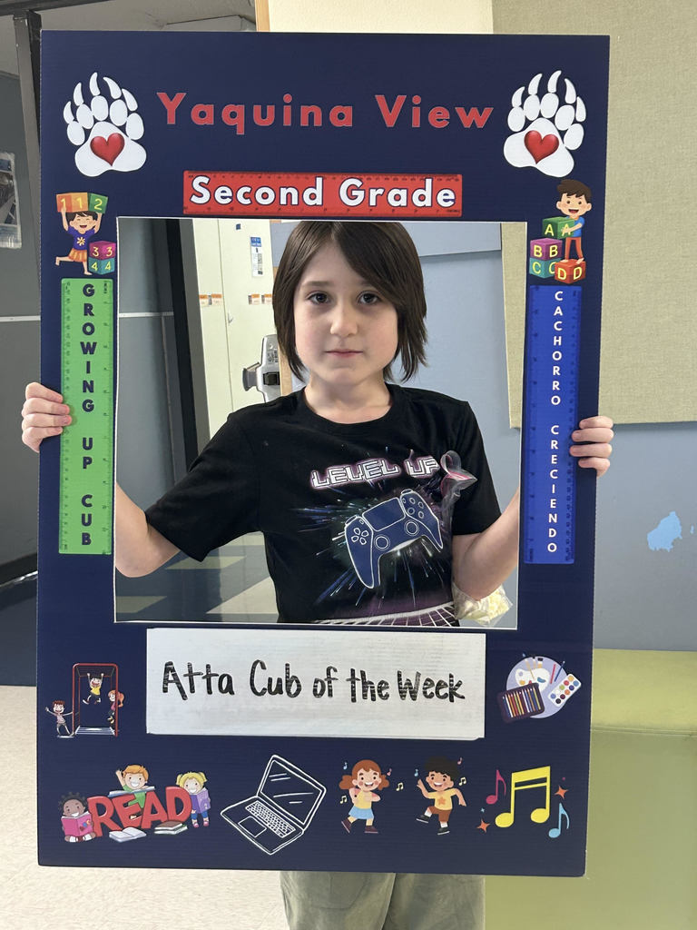 Smiling boy hold Atta Cub Kid of the Week