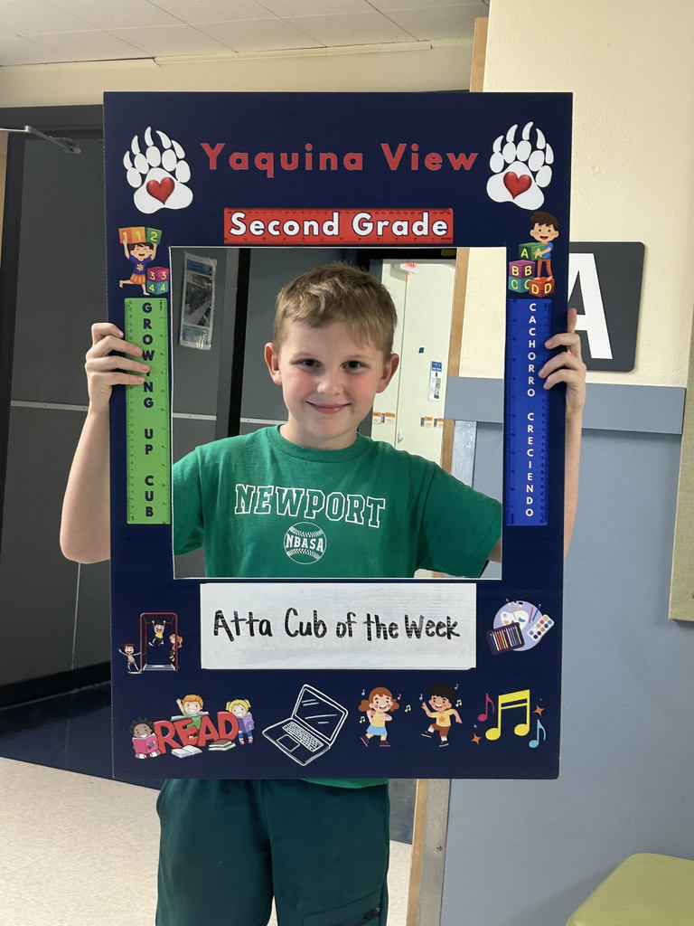 Smiling boy hold Atta Cub Kid of the Week