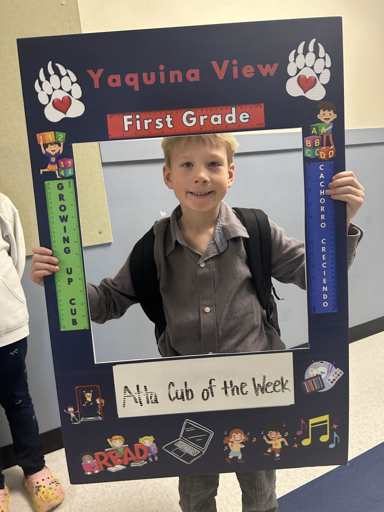 Smiling boy hold Atta Cub Kid of the Week