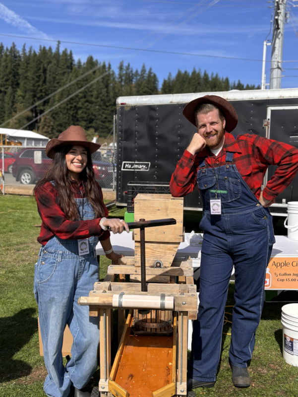 man and woman in overalls
