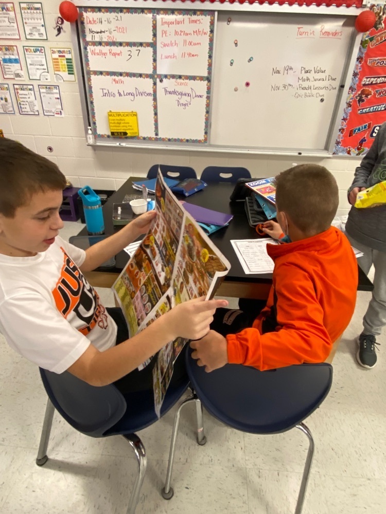 Students searching through local ads. 