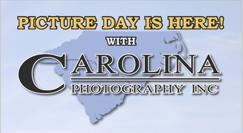 Graphic announcement with the text "PICTURE DAY IS HERE! WITH CAROLINA PHOTOGRAPHY INC" set against a light blue sky background featuring an outline map of North and South Carolina.