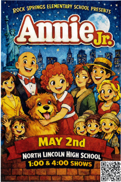 A theater poster for an elementary school production of "Annie, Jr." presents a stylized, animated illustration of the cast in front of a New York City skyline.  At the top of the poster, text reads, "ROCK SPRINGS ELEMENTARY SCHOOL PRESENTS." Below this, the title "Annie, Jr." is displayed in large, bubbly red letters with white trim. In the upper right corner, a full moon sits against a dark, starry night sky.  The main illustration features Annie, a girl with short, curly orange hair, as she hugs a scruffy brown dog. A large cast of other characters surrounds her, including a smiling bald man with a red bowtie, a woman with a yellow business suit, another woman with a faux-fur stole, and a man with a fedora. Below the main cast, five girls with varying hair colors and knitted caps cluster together.  The lower portion of the poster has a red banner across the front. Text in yellow and white is written over the banner: “MAY 2ND” “NORTH LINCOLN HIGH SCHOOL” “1:00 & 4:00 SHOWS”  Below the banner, a brown brick wall texture is featured, and a QR code is displayed in the bottom right corner.