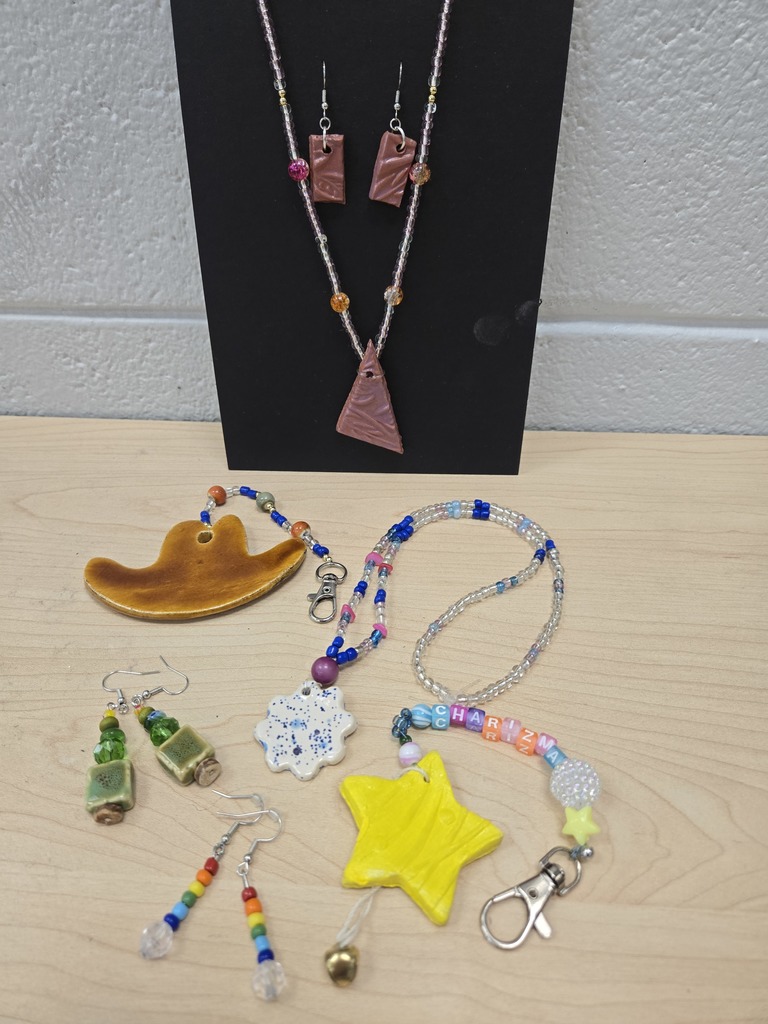 Fourth photo is of a variety of handmade jewelry.