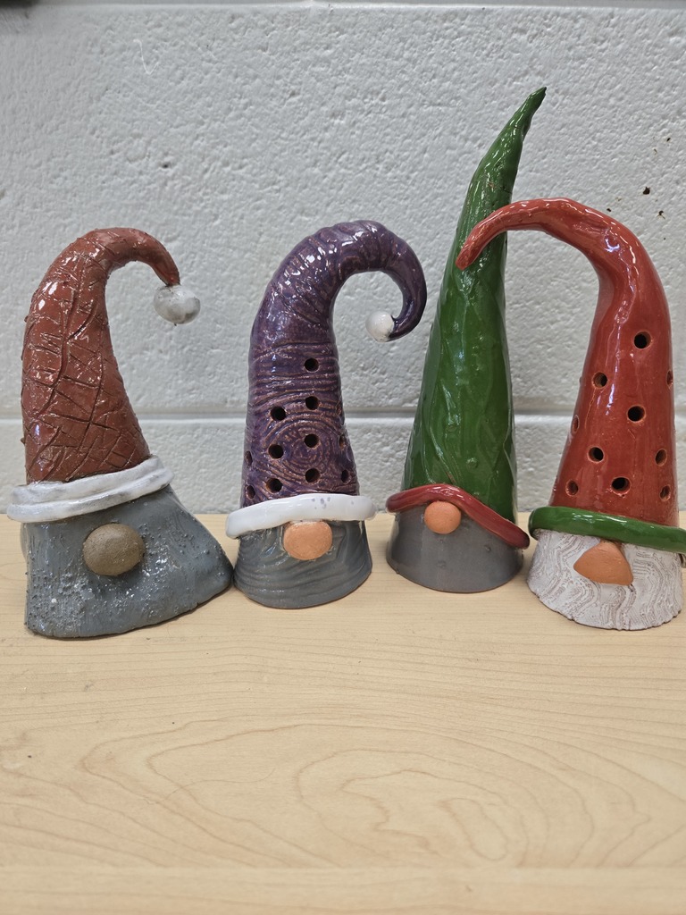 Third photo is of ceramic gnomes in various colors.