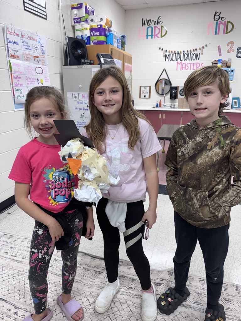 Mrs. Nordmark's students work in groups to build the biggest snowman.