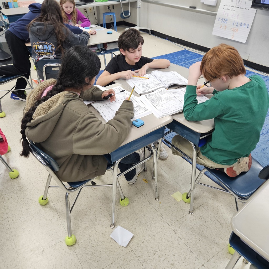 students working on fractions