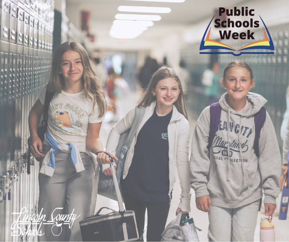 Three middle school students walk down a school hallway lined with lockers, smiling and carrying backpacks and lunch bags. Other students are visible in the background. In the top right corner, a graphic reads “Public Schools Week” with an open book icon. The Lincoln County Schools logo appears in the lower left corner.