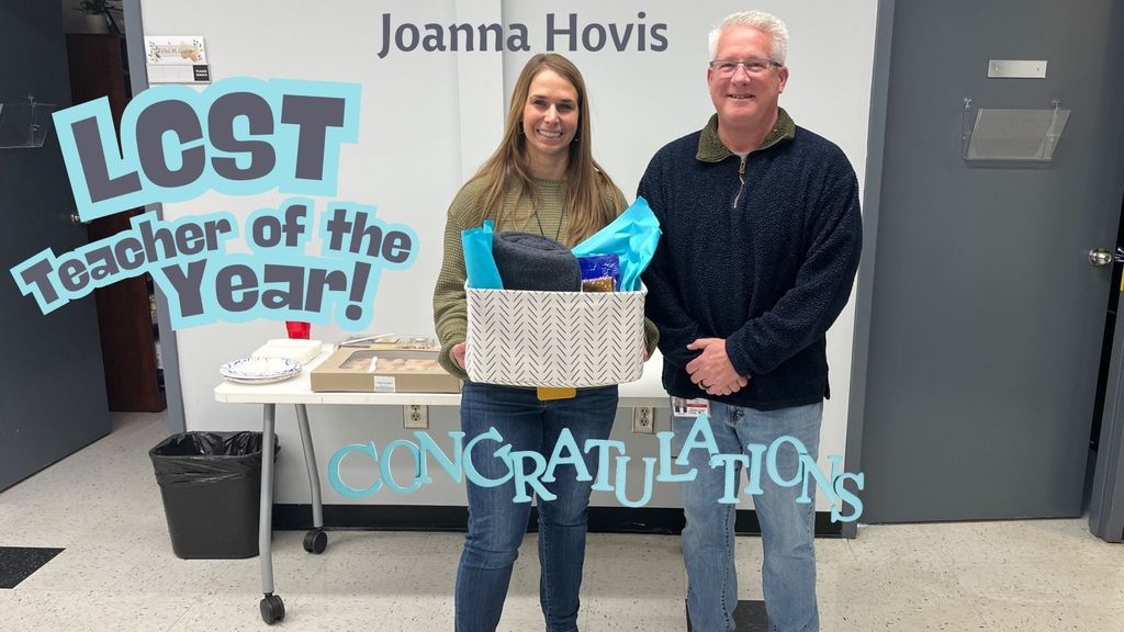 Mrs. Hovis (Teacher of the Year) and Mr. Clary (Principal)