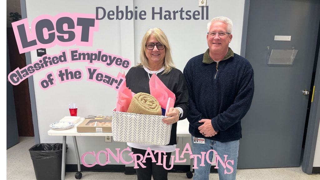 Mrs. Hartsell (Classified Employee of the Year) and Mr. Clary (principal)