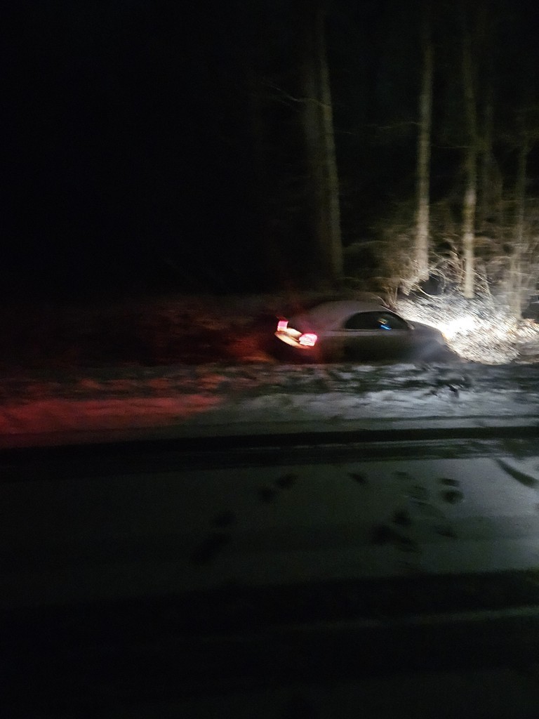 car in ditch
