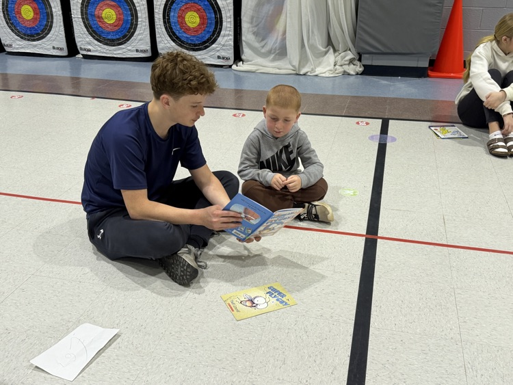 WLMS beta club reading aloud to our students