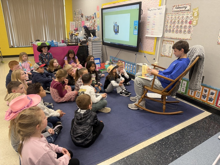 WLMS beta club reading aloud to our students