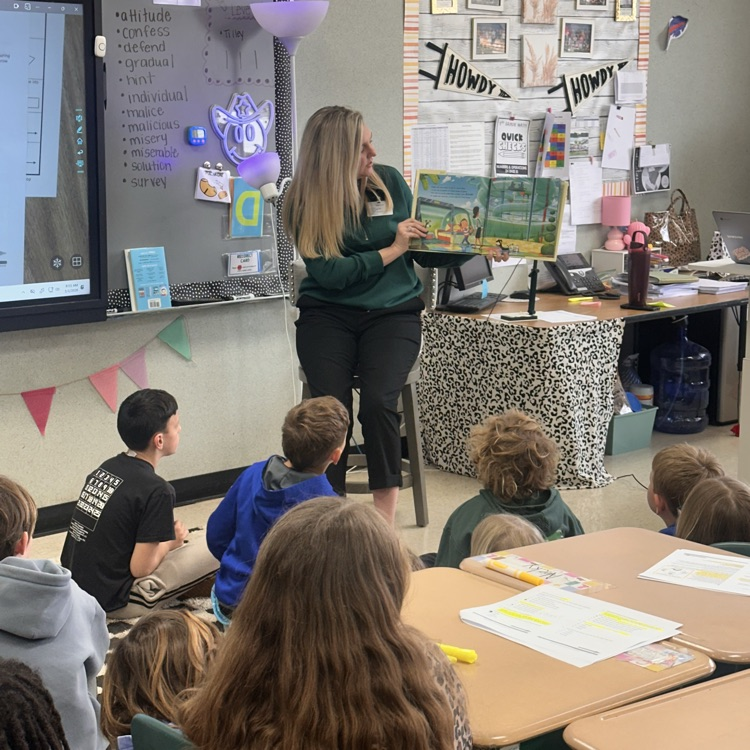 Mrs. Tench reads to 3rd graders