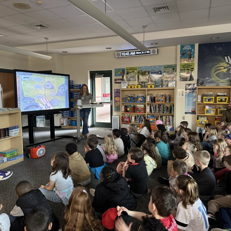 Mrs. Heavner reads to 1st graders