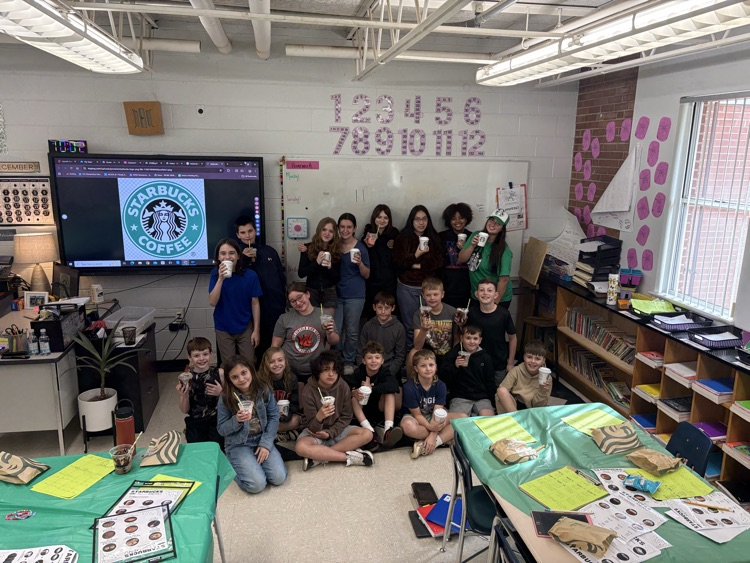 students enjoying a Starbucks treat after completing math work