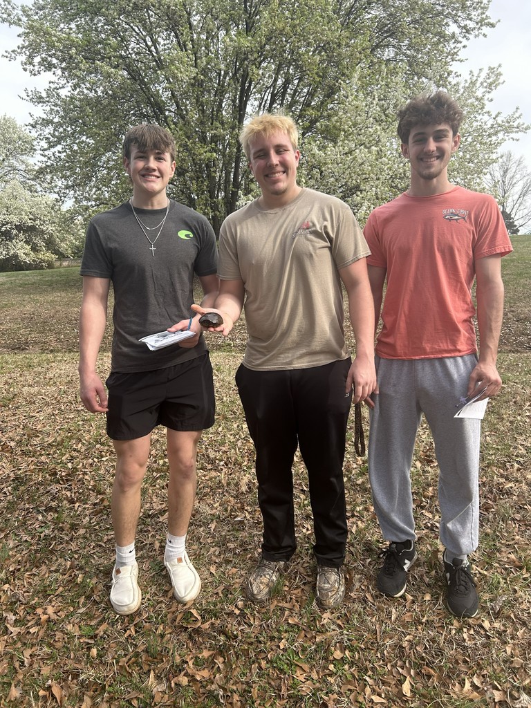 students on a nature walk for class