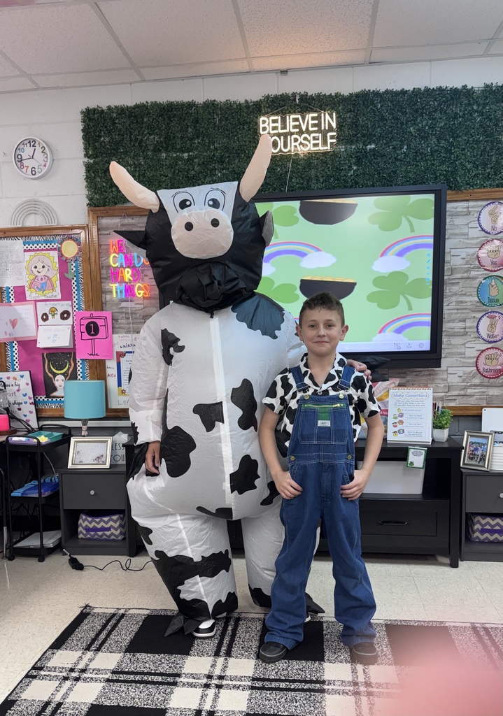 Farmer Chevee with a Mystery Cow