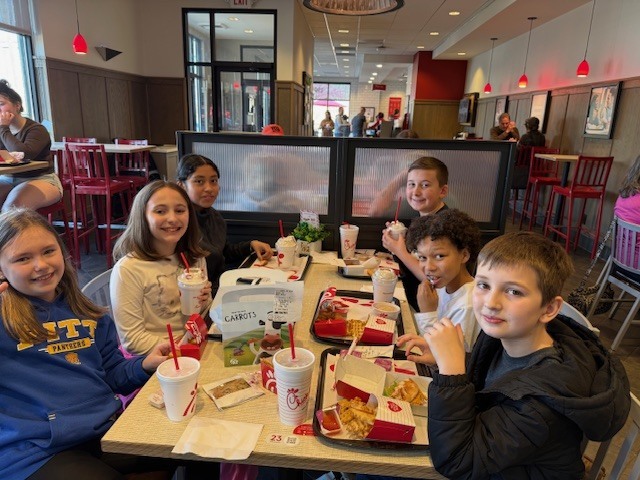 students enjoying a meal together before the interview