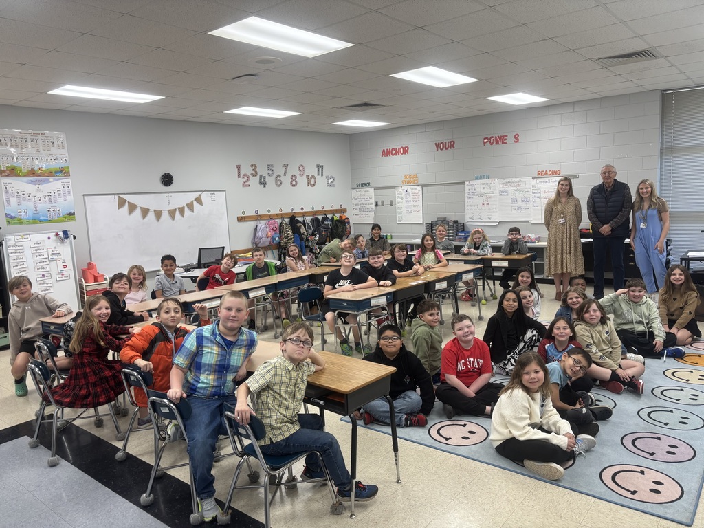 Teachers and students pose for a picture with the Mayor to conclude a social studies unit about Government.