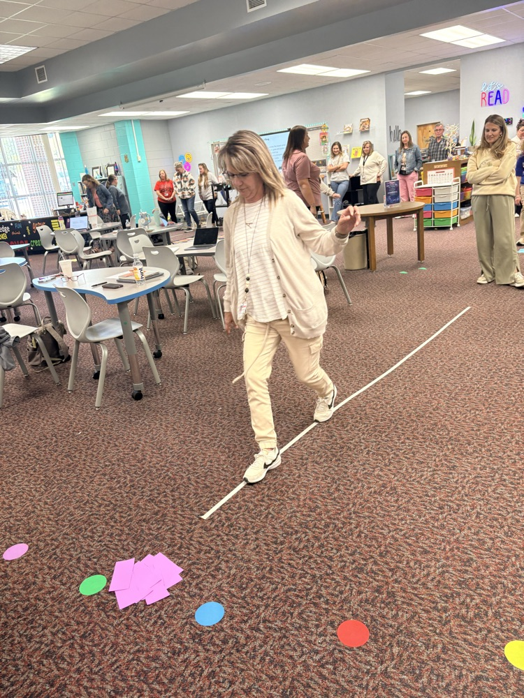 union staff  meeting included teachers working in on professional games and learning academic benefits of engaging games