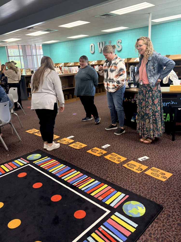 union staff  meeting included teachers working in on professional games and learning academic benefits of engaging games