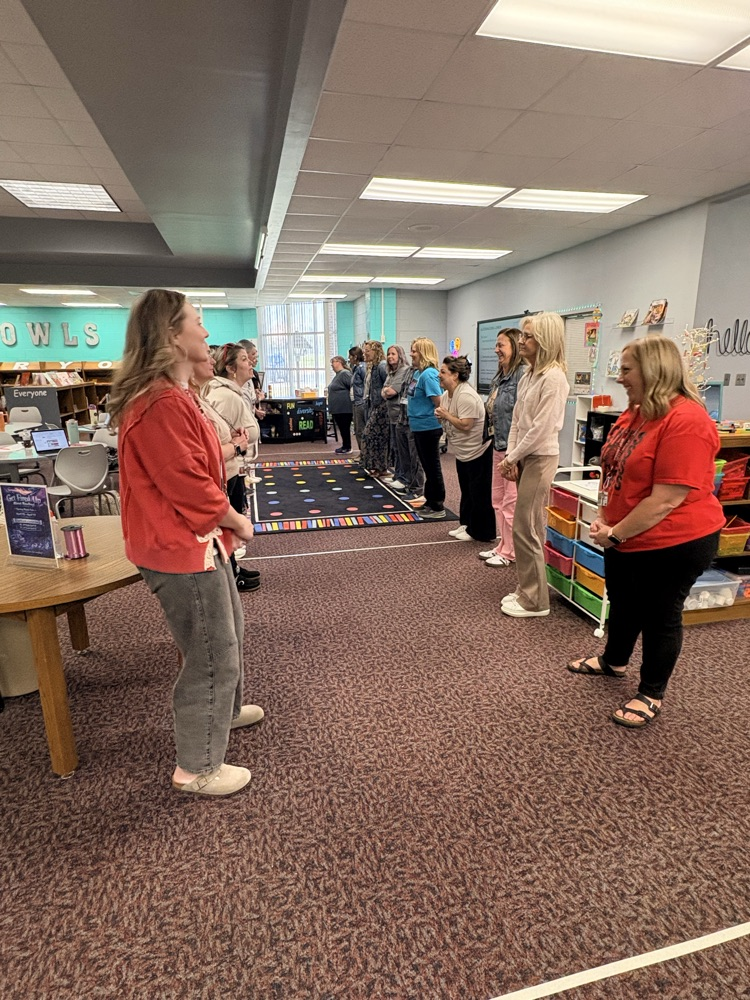 union staff  meeting included teachers working in on professional games and learning academic benefits of engaging games