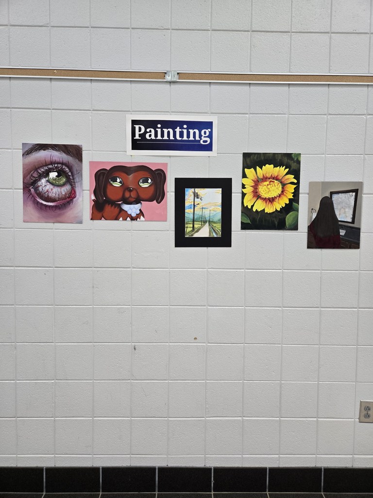 5 paintings hang on a wall. 