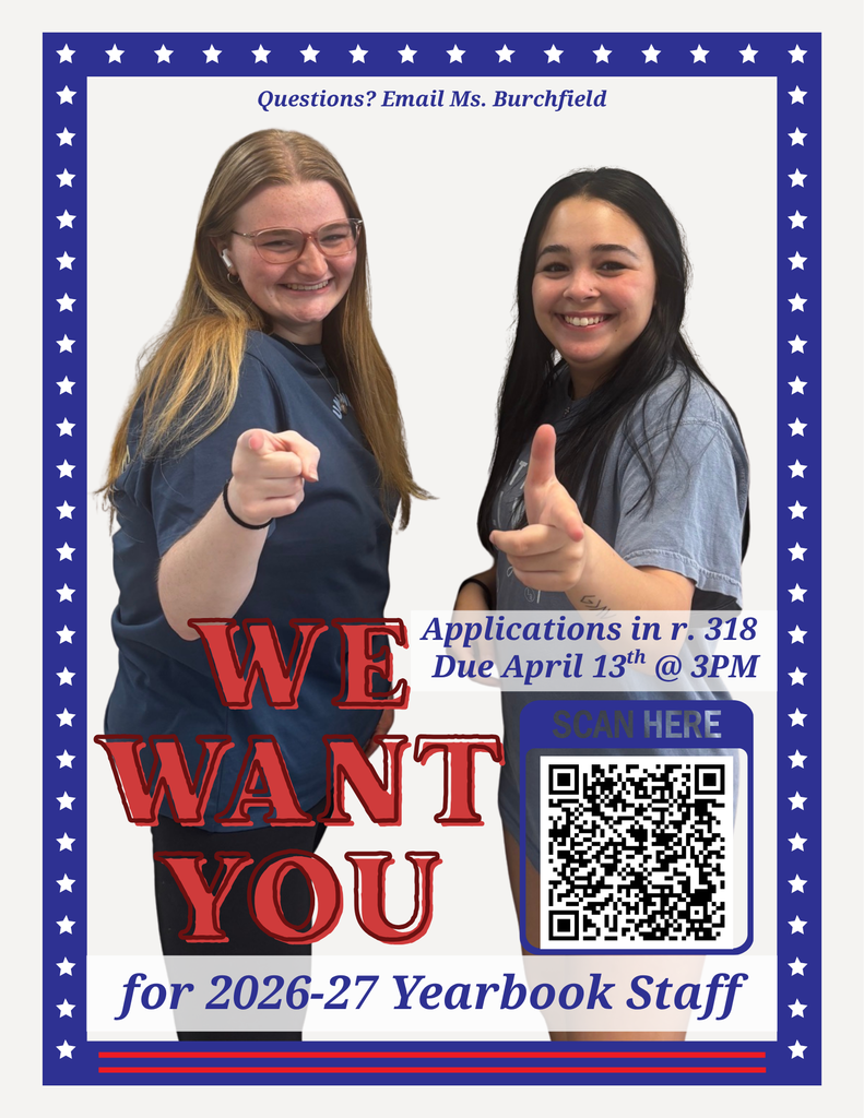 Two smiling girls stand with thumbs up. One has glasses, both wear blue shirts. Text: "WE WANT YOU for 2026-27 Yearbook Staff." Blue and white stars on border.